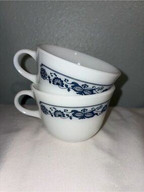 vintage Pyrex milk glass coffee cups in the Old Town Blue pattern.